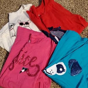 Four Justice tank tops